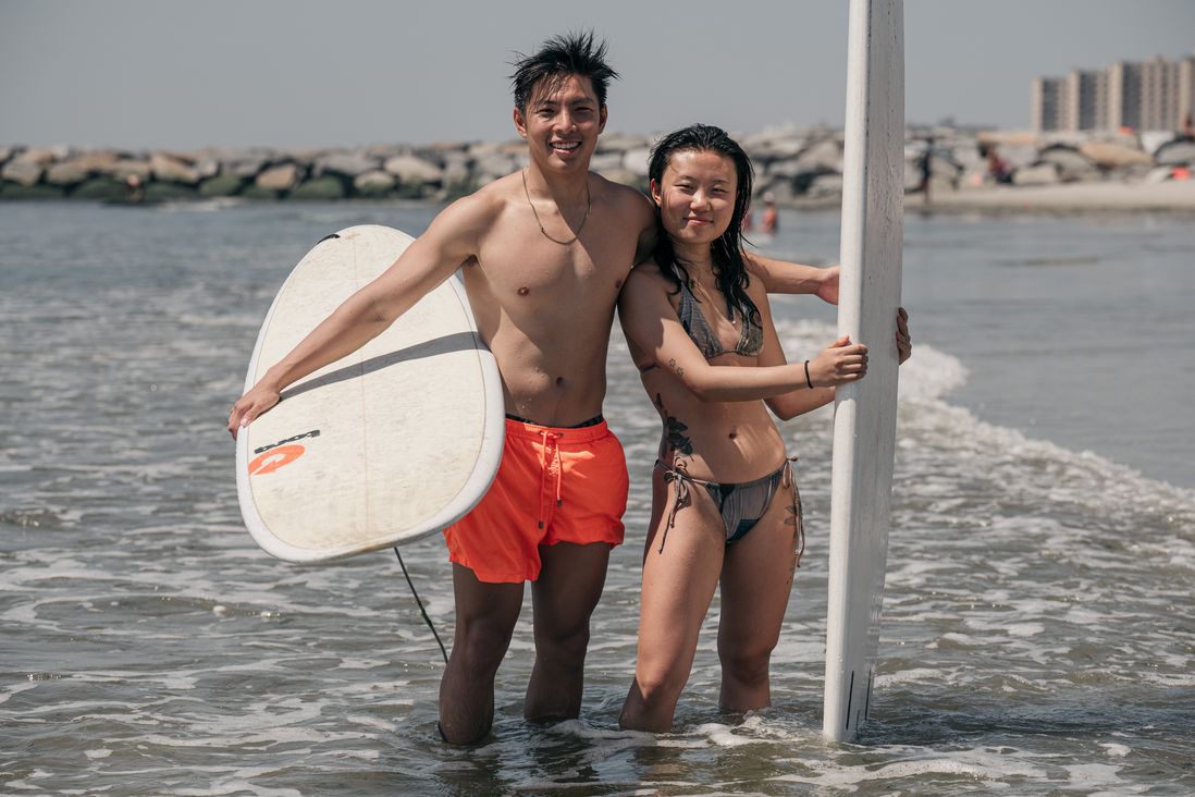 Surfers Lucas Tay and Irene Ryu.